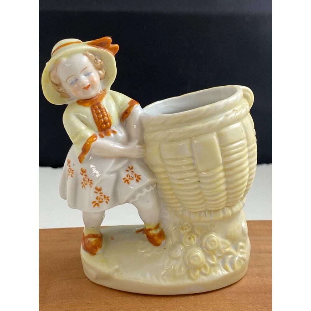 VINTAGE porcelain girl with wicker basket figurine